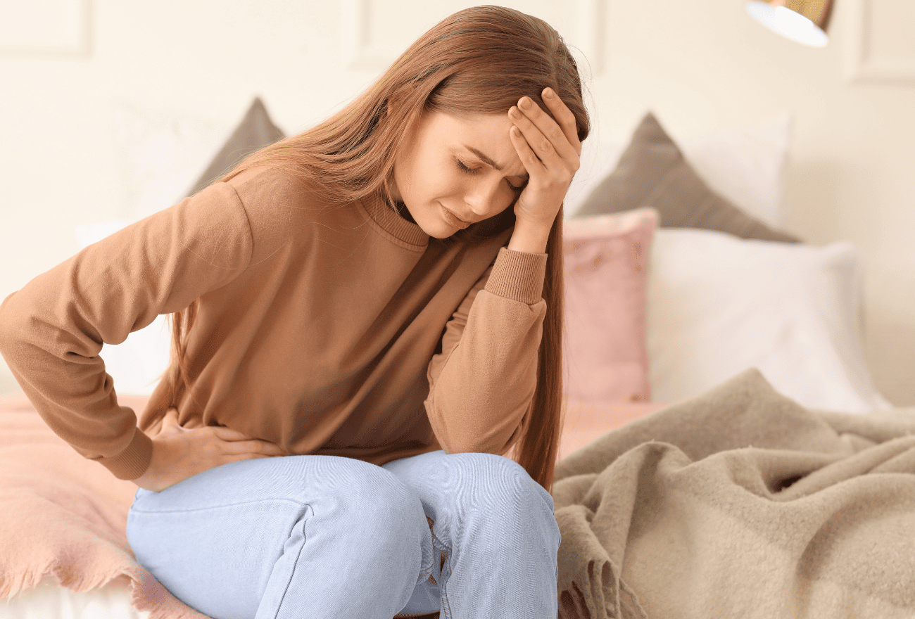 Femme ayant de la fièvre et une gastro