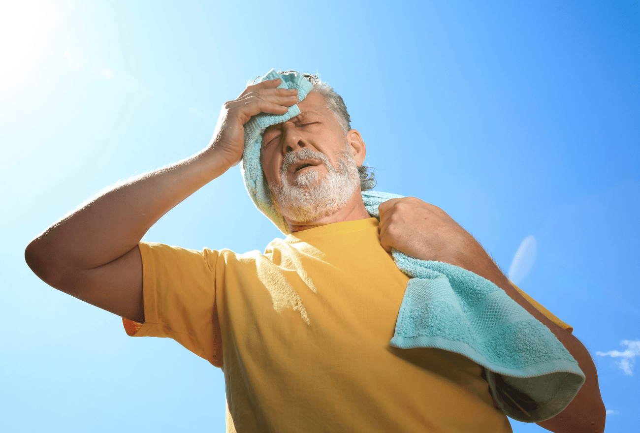 Homme victime d'insolation en plein soleil